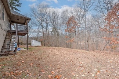 This charming  home with great curb appeal has a fantastic on Bella Vista - Metfield Golf Complex and Country Club in Arkansas - for sale on GolfHomes.com, golf home, golf lot