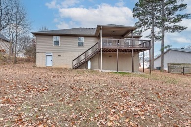 This charming  home with great curb appeal has a fantastic on Bella Vista - Metfield Golf Complex and Country Club in Arkansas - for sale on GolfHomes.com, golf home, golf lot