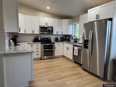 Welcome to this beautifully updated tri-level home at 3820 on Riverton Country Club in Wyoming - for sale on GolfHomes.com, golf home, golf lot
