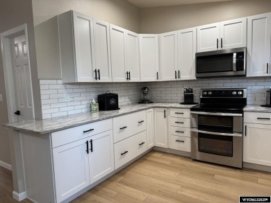 Welcome to this beautifully updated tri-level home at 3820 on Riverton Country Club in Wyoming - for sale on GolfHomes.com, golf home, golf lot