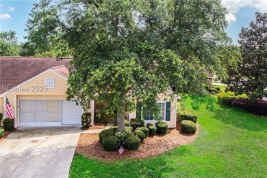 This custom Charleston model has it all--end unit with abundant on Okatie Creek Golf Club in South Carolina - for sale on GolfHomes.com, golf home, golf lot