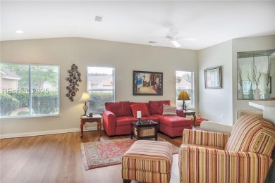 This custom Charleston model has it all--end unit with abundant on Okatie Creek Golf Club in South Carolina - for sale on GolfHomes.com, golf home, golf lot