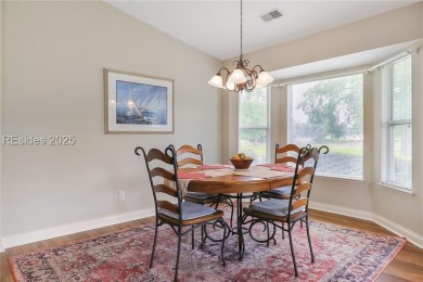 This custom Charleston model has it all--end unit with abundant on Okatie Creek Golf Club in South Carolina - for sale on GolfHomes.com, golf home, golf lot