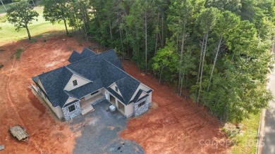 New Construction home in Tillery Tradition located overlooking on The Tillery Tradition Country Club in North Carolina - for sale on GolfHomes.com, golf home, golf lot