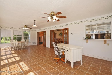 This Suntree Country Club home with view of Fairway 2 of Classic on Suntree Country Club in Florida - for sale on GolfHomes.com, golf home, golf lot