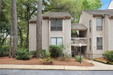 Updated and fully furnished top-floor corner unit in Lighthouse on Harbour Town Golf Links in South Carolina - for sale on GolfHomes.com, golf home, golf lot
