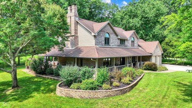 Experience luxury living in this impeccably crafted two-story on Foxcliff Golf Club in Indiana - for sale on GolfHomes.com, golf home, golf lot