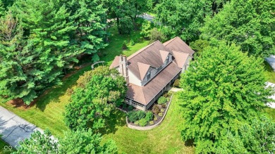 Experience luxury living in this impeccably crafted two-story on Foxcliff Golf Club in Indiana - for sale on GolfHomes.com, golf home, golf lot