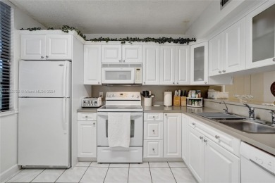 Welcome to this TOTALLY REMODELED condo located in an all-age on Pine Island Ridge Country Club in Florida - for sale on GolfHomes.com, golf home, golf lot