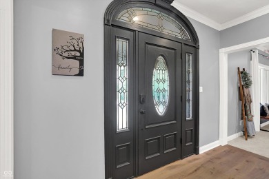 Experience luxury living in this impeccably crafted two-story on Foxcliff Golf Club in Indiana - for sale on GolfHomes.com, golf home, golf lot