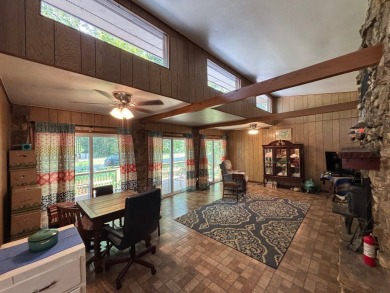 NEW LISTING!! This residence offers diverse possibilities on Cherokee Village South Course in Arkansas - for sale on GolfHomes.com, golf home, golf lot