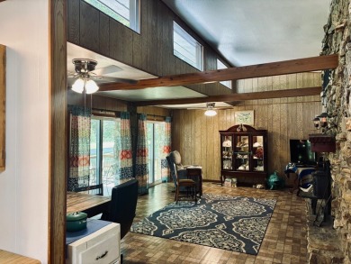 NEW LISTING!! This residence offers diverse possibilities on Cherokee Village South Course in Arkansas - for sale on GolfHomes.com, golf home, golf lot