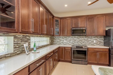 Welcome to this luxurious residence in the gated Crescent Oaks on Crescent Oaks Country Club in Florida - for sale on GolfHomes.com, golf home, golf lot