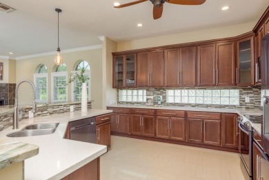 Welcome to this luxurious residence in the gated Crescent Oaks on Crescent Oaks Country Club in Florida - for sale on GolfHomes.com, golf home, golf lot