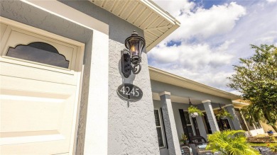 Welcome to this STUNNING POOL HOME situated on the 10th hole of on Arlington Ridge Golf Club in Florida - for sale on GolfHomes.com, golf home, golf lot