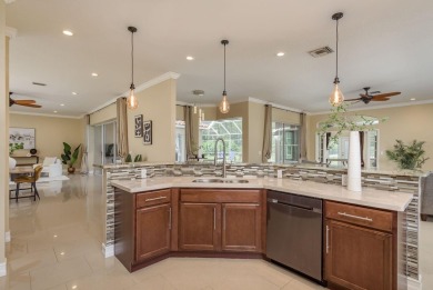 Welcome to this luxurious residence in the gated Crescent Oaks on Crescent Oaks Country Club in Florida - for sale on GolfHomes.com, golf home, golf lot