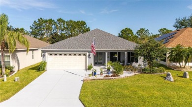 Welcome to this STUNNING POOL HOME situated on the 10th hole of on Arlington Ridge Golf Club in Florida - for sale on GolfHomes.com, golf home, golf lot