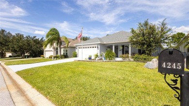 Welcome to this STUNNING POOL HOME situated on the 10th hole of on Arlington Ridge Golf Club in Florida - for sale on GolfHomes.com, golf home, golf lot