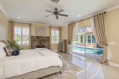 Welcome to this luxurious residence in the gated Crescent Oaks on Crescent Oaks Country Club in Florida - for sale on GolfHomes.com, golf home, golf lot