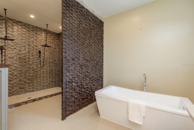Welcome to this luxurious residence in the gated Crescent Oaks on Crescent Oaks Country Club in Florida - for sale on GolfHomes.com, golf home, golf lot