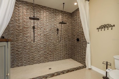 Welcome to this luxurious residence in the gated Crescent Oaks on Crescent Oaks Country Club in Florida - for sale on GolfHomes.com, golf home, golf lot