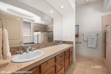 This spacious Cinco townhome is situated high above Mesquite and on The Oasis Golf Club in Nevada - for sale on GolfHomes.com, golf home, golf lot