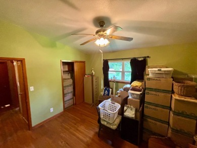 NEW LISTING!! This residence offers diverse possibilities on Cherokee Village South Course in Arkansas - for sale on GolfHomes.com, golf home, golf lot