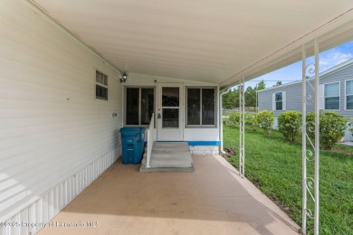 Beautifully Updated 3-Bedroom, 2-Bath Home with An EXTRA Lot on High Point Golf Club, Inc. in Florida - for sale on GolfHomes.com, golf home, golf lot