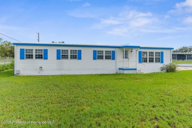 Beautifully Updated 3-Bedroom, 2-Bath Home with An EXTRA Lot on High Point Golf Club, Inc. in Florida - for sale on GolfHomes.com, golf home, golf lot