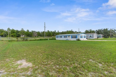 Beautifully Updated 3-Bedroom, 2-Bath Home with An EXTRA Lot on High Point Golf Club, Inc. in Florida - for sale on GolfHomes.com, golf home, golf lot