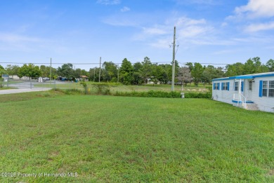 Beautifully Updated 3-Bedroom, 2-Bath Home with An EXTRA Lot on High Point Golf Club, Inc. in Florida - for sale on GolfHomes.com, golf home, golf lot