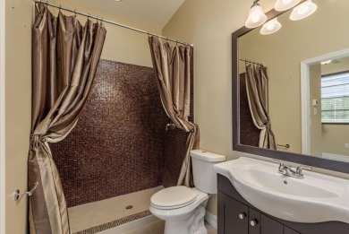 Welcome to this luxurious residence in the gated Crescent Oaks on Crescent Oaks Country Club in Florida - for sale on GolfHomes.com, golf home, golf lot