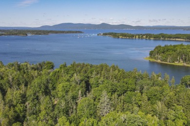 This parcel of waterfront land is perched up and out of the on Tarratine Golf Club in Maine - for sale on GolfHomes.com, golf home, golf lot