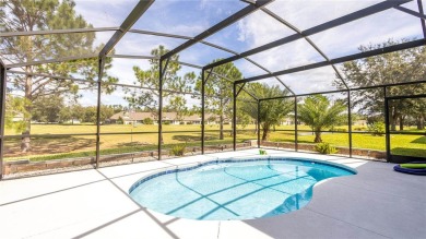 Welcome to this STUNNING POOL HOME situated on the 10th hole of on Arlington Ridge Golf Club in Florida - for sale on GolfHomes.com, golf home, golf lot