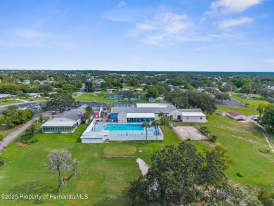 Beautifully Updated 3-Bedroom, 2-Bath Home with An EXTRA Lot on High Point Golf Club, Inc. in Florida - for sale on GolfHomes.com, golf home, golf lot