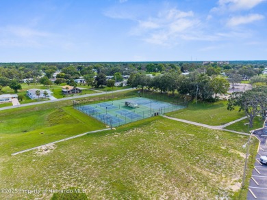 Beautifully Updated 3-Bedroom, 2-Bath Home with An EXTRA Lot on High Point Golf Club, Inc. in Florida - for sale on GolfHomes.com, golf home, golf lot