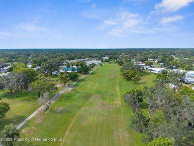 Beautifully Updated 3-Bedroom, 2-Bath Home with An EXTRA Lot on High Point Golf Club, Inc. in Florida - for sale on GolfHomes.com, golf home, golf lot