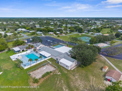 Beautifully Updated 3-Bedroom, 2-Bath Home with An EXTRA Lot on High Point Golf Club, Inc. in Florida - for sale on GolfHomes.com, golf home, golf lot