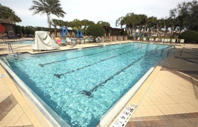 Welcome to this STUNNING POOL HOME situated on the 10th hole of on Arlington Ridge Golf Club in Florida - for sale on GolfHomes.com, golf home, golf lot