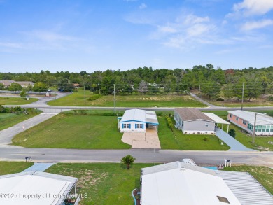 Beautifully Updated 3-Bedroom, 2-Bath Home with An EXTRA Lot on High Point Golf Club, Inc. in Florida - for sale on GolfHomes.com, golf home, golf lot