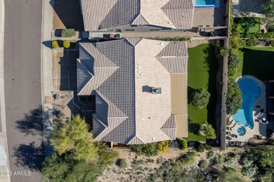 Nestled in Troon North's Echo Ridge, this residence boasts an on Troon Country Club in Arizona - for sale on GolfHomes.com, golf home, golf lot