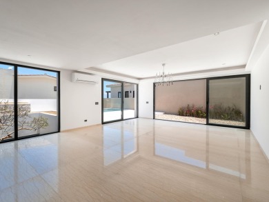 Sophisticated and solidly built, this 5,588 sq.ft. estate in on  in  - for sale on GolfHomes.com, golf home, golf lot