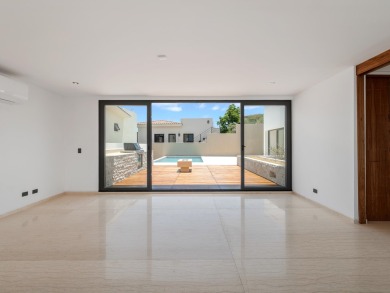 Sophisticated and solidly built, this 5,588 sq.ft. estate in on  in  - for sale on GolfHomes.com, golf home, golf lot
