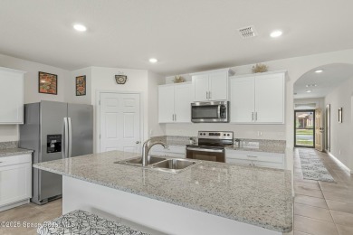 Welcome to this beautiful 4-bedroom, 2-bathroom home, built in on Majors Golf Club At Bayside Lakes in Florida - for sale on GolfHomes.com, golf home, golf lot