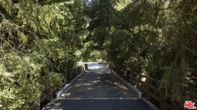 Gorgeous custom-built estate tucked away on a private street in on North Ranch Country Club in California - for sale on GolfHomes.com, golf home, golf lot