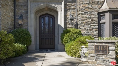 Gorgeous custom-built estate tucked away on a private street in on North Ranch Country Club in California - for sale on GolfHomes.com, golf home, golf lot