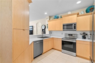 This beautifully renovated 1st-floor villa with golf course on Santa Lucia River Club in Florida - for sale on GolfHomes.com, golf home, golf lot