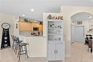 This beautifully renovated 1st-floor villa with golf course on Santa Lucia River Club in Florida - for sale on GolfHomes.com, golf home, golf lot