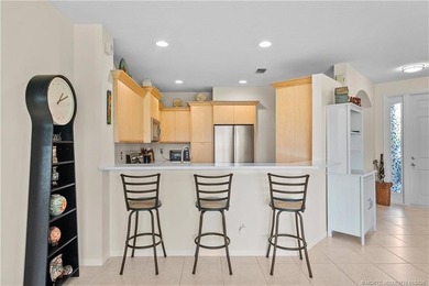 This beautifully renovated 1st-floor villa with golf course on Santa Lucia River Club in Florida - for sale on GolfHomes.com, golf home, golf lot