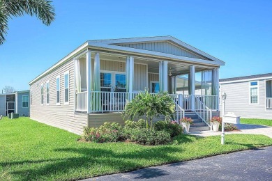 OUTSTANDING ONE OF A KIND NEWER HOME WITH HUGE & INVITING FRONT on Royal Wood Golf and Country Club in Florida - for sale on GolfHomes.com, golf home, golf lot